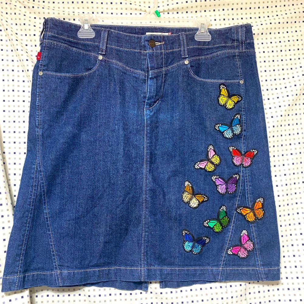 Levi’s Denim skirt with Embroidered butterfly appliqué.